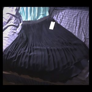 Girl with curves high-low pleated skirt